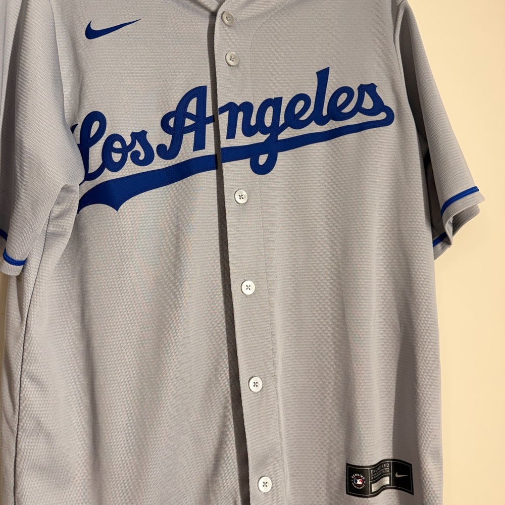 Nike Light Gray Athletic Shirt with White Swoosh